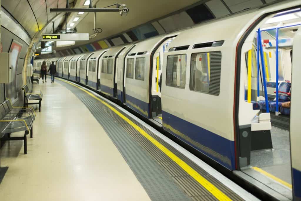 A train is on full stop in an underground station.