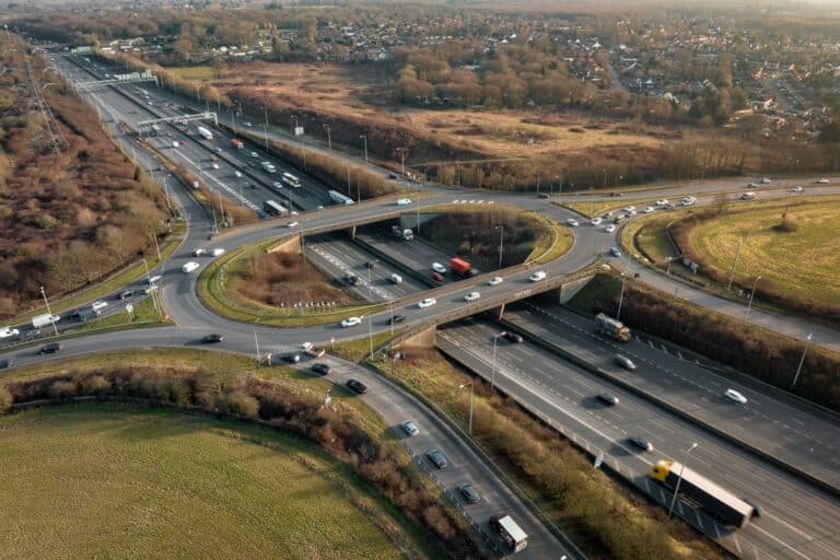 Aerial view of M25 motorway in the concept of 'Can You Use a Man and Van Service for Long Distance Moves to Orpington?'